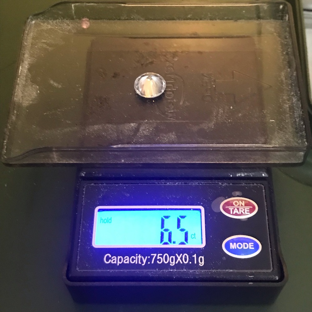 Assortment of different loose diamonds and gems